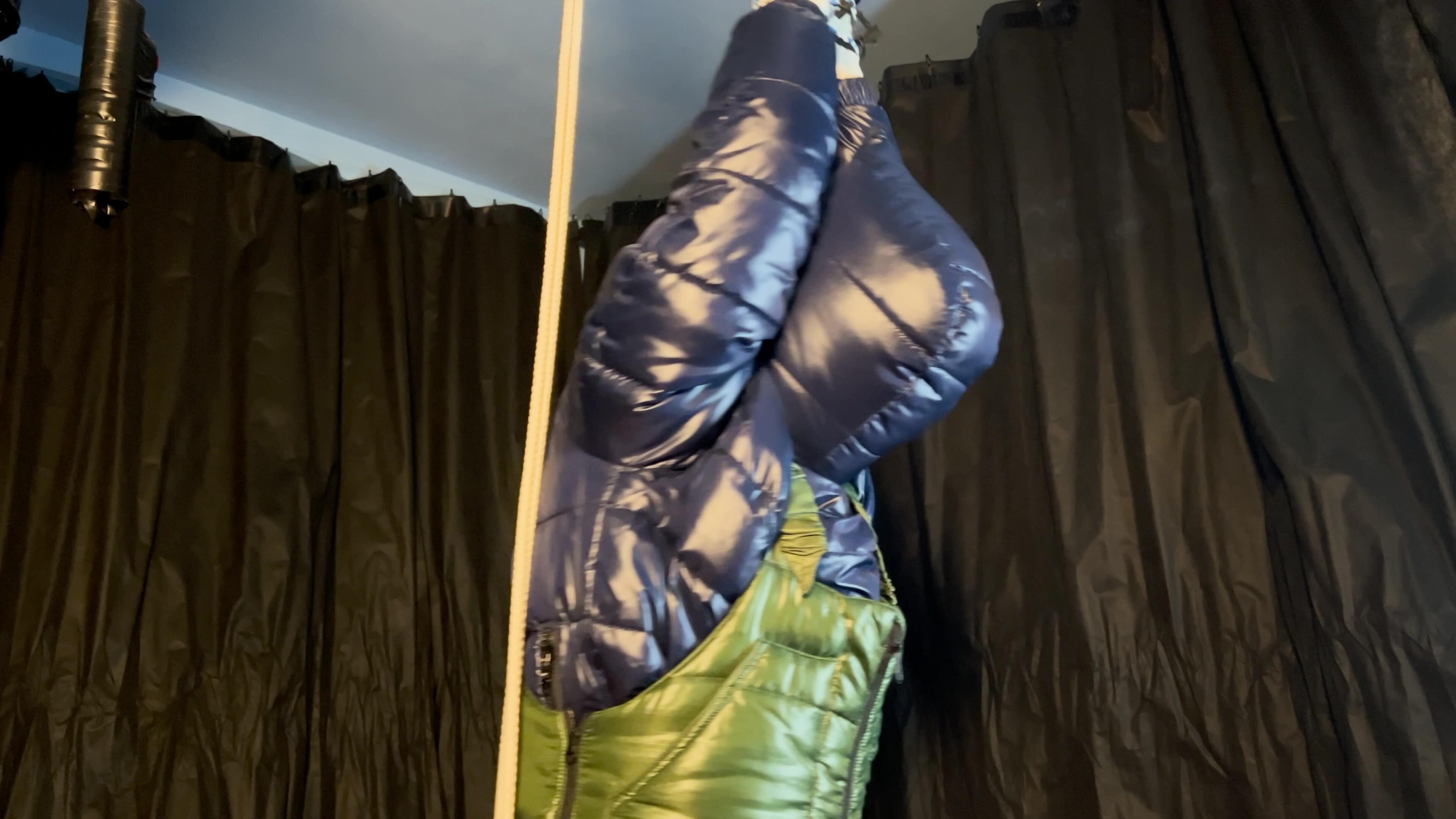 Clipspool | Sebastien tied by the hands in a down jacket.