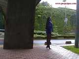 016087 Eve Braves The Light Rain To Find Somewhere To Pee 4