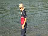 Watch Chloe enjoying her shiny nylon Rainwear at the River 10