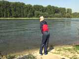 Watch Chloe enjoying her shiny nylon Rainwear at the River 6
