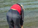 Watch Chloe enjoying her shiny nylon Rainwear at the River 7