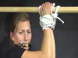 Watch Sandra bound and gagged in her shiny nylon Shorts riding a wooden Pony 8