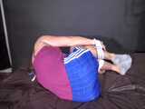 watch a short Video clip with Pia enjoying Bondage in her shiny nylon Shorts 9