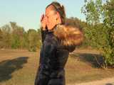 Watch Sandra enjoying her shiny nylon Downjacket at very warm Wearther outside 10