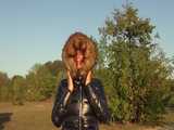 Watch Sandra enjoying her shiny nylon Downjacket at very warm Wearther outside 7