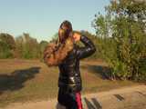 Watch Sandra enjoying her shiny nylon Downjacket at very warm Wearther outside 9