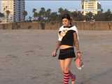 033005 Renee Takes A Daring Pee On Muscle Beach 4