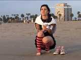033005 Renee Takes A Daring Pee On Muscle Beach 7