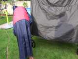 Watch Sandra enjoying the Sun in her shiny nylon Rainjacket and Rainskirt 9