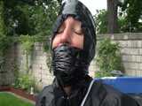 Watch Sandra enjoying Bondage  in her shiny nylon  Rainwear outside 7