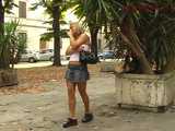 023060 Ewa Takes Cover By A Planter To Pee In The Square 7