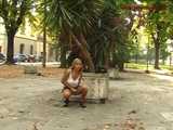 023060 Ewa Takes Cover By A Planter To Pee In The Square 8