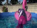 Watch Sandra enjoying her shiny nylon Downwear at a warm Summer Day in the Garden and in the Pool 10